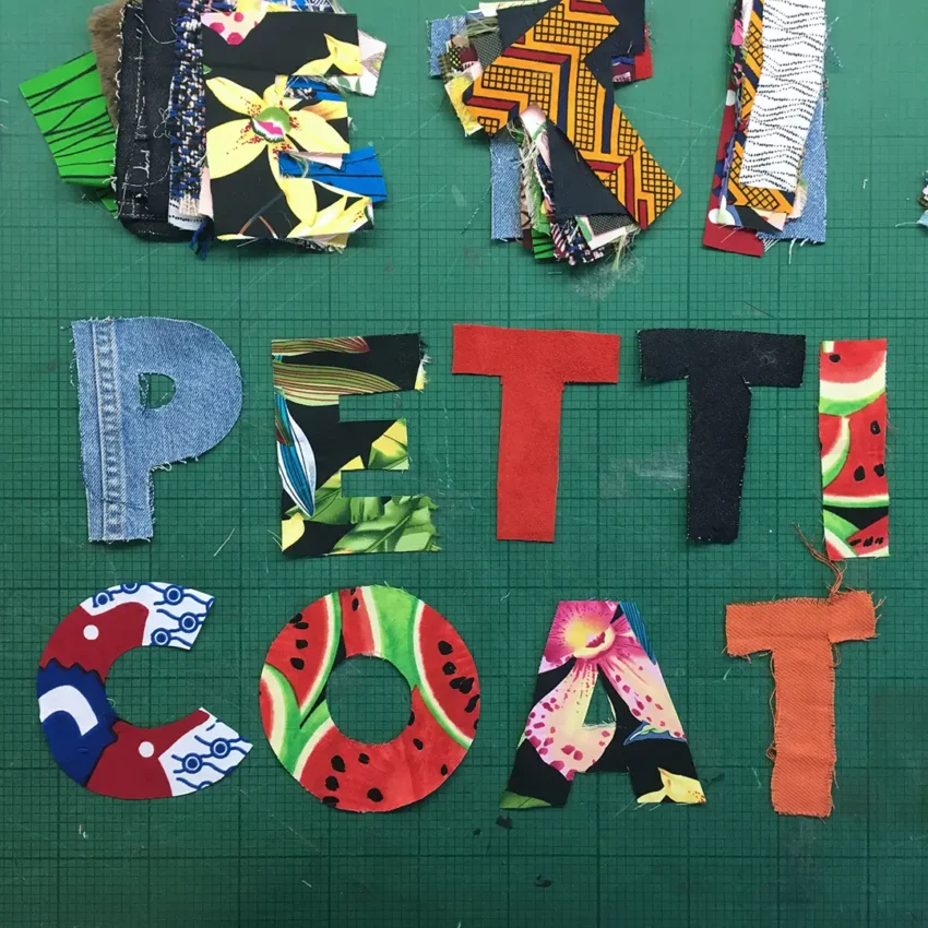 Petticoat Lane Market crafting of the letters, fabric cutouts